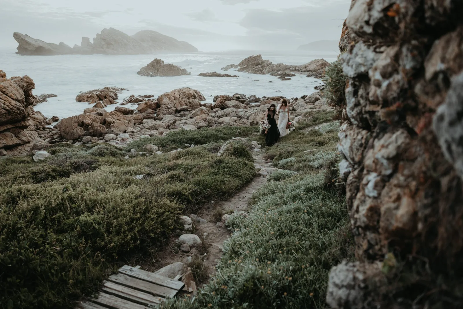 Jess and Lara making their way along the wild Robberg coastline
